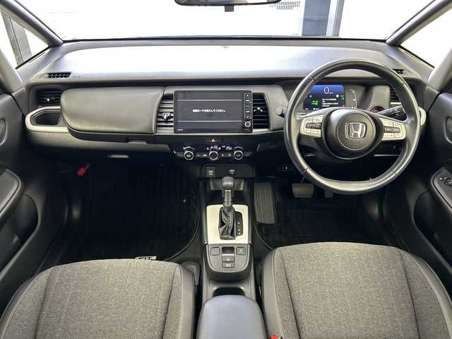 ホンダ フィット e:HEVホーム 奈良県 2024(令6)年 1.2万km クリスタルブラックパール 純正ギャザーズ9インチナビ/フルセグ CD DVD BT MSV USB/バックカメラ/ビルトインETC/レーダークルーズコントロール/衝突軽減ブレーキ/踏み間違い/パーキングセンサー/レーンキープアシスト/電子パーキング/BREAK HOLD/純正ギャザーズドライブレコーダー/ハーフレザーシート/LEDヘッドライト/オートライト/オートハイビーム/スマートキー/純正ドアバイザー/純正フロアマット/電動格納ミラー