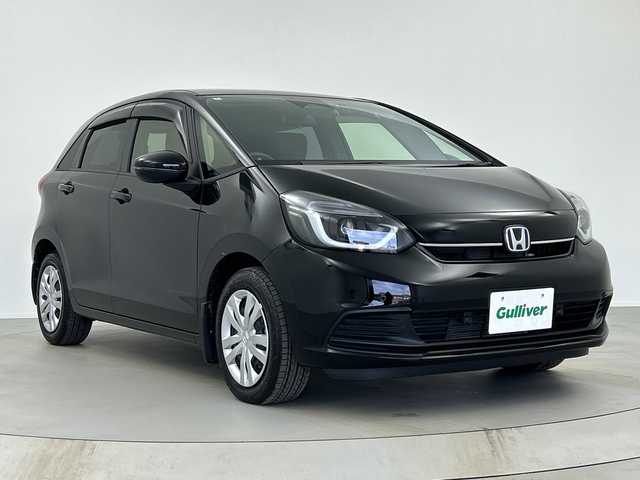 ホンダ フィット e:HEVホーム 奈良県 2024(令6)年 1.2万km クリスタルブラックパール 純正ギャザーズ9インチナビ/フルセグ CD DVD BT MSV USB/バックカメラ/ビルトインETC/レーダークルーズコントロール/衝突軽減ブレーキ/踏み間違い/パーキングセンサー/レーンキープアシスト/電子パーキング/BREAK HOLD/純正ギャザーズドライブレコーダー/ハーフレザーシート/LEDヘッドライト/オートライト/オートハイビーム/スマートキー/純正ドアバイザー/純正フロアマット/電動格納ミラー