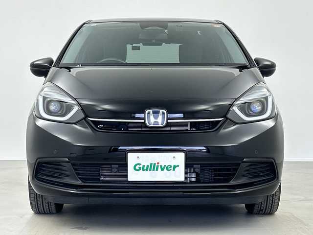 ホンダ フィット e:HEVホーム 奈良県 2024(令6)年 1.2万km クリスタルブラックパール 純正ギャザーズ9インチナビ/フルセグ CD DVD BT MSV USB/バックカメラ/ビルトインETC/レーダークルーズコントロール/衝突軽減ブレーキ/踏み間違い/パーキングセンサー/レーンキープアシスト/電子パーキング/BREAK HOLD/純正ギャザーズドライブレコーダー/ハーフレザーシート/LEDヘッドライト/オートライト/オートハイビーム/スマートキー/純正ドアバイザー/純正フロアマット/電動格納ミラー