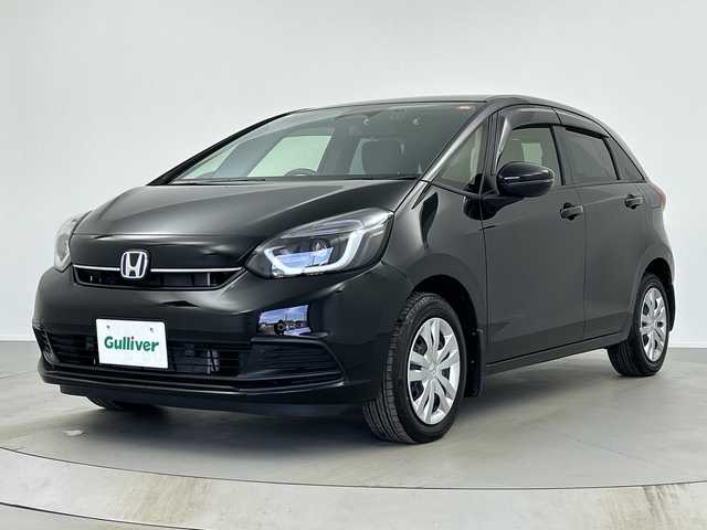 ホンダ フィット e:HEVホーム 奈良県 2024(令6)年 1.2万km クリスタルブラックパール 純正ギャザーズ9インチナビ/フルセグ CD DVD BT MSV USB/バックカメラ/ビルトインETC/レーダークルーズコントロール/衝突軽減ブレーキ/踏み間違い/パーキングセンサー/レーンキープアシスト/電子パーキング/BREAK HOLD/純正ギャザーズドライブレコーダー/ハーフレザーシート/LEDヘッドライト/オートライト/オートハイビーム/スマートキー/純正ドアバイザー/純正フロアマット/電動格納ミラー