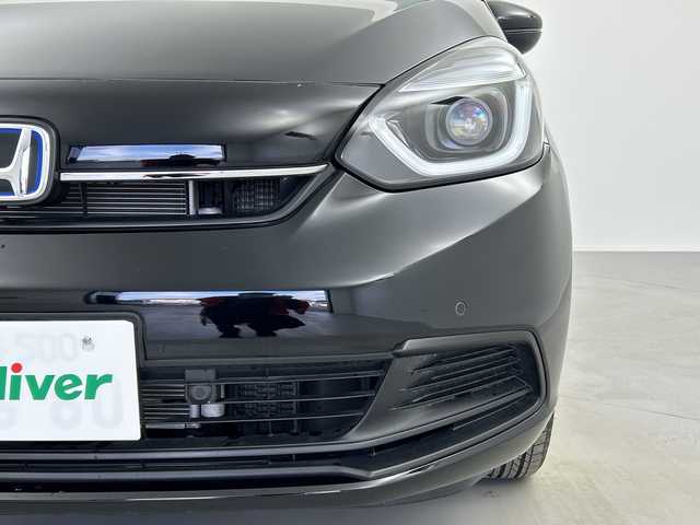ホンダ フィット e:HEVホーム 奈良県 2024(令6)年 1.2万km クリスタルブラックパール 純正ギャザーズ9インチナビ/フルセグ CD DVD BT MSV USB/バックカメラ/ビルトインETC/レーダークルーズコントロール/衝突軽減ブレーキ/踏み間違い/パーキングセンサー/レーンキープアシスト/電子パーキング/BREAK HOLD/純正ギャザーズドライブレコーダー/ハーフレザーシート/LEDヘッドライト/オートライト/オートハイビーム/スマートキー/純正ドアバイザー/純正フロアマット/電動格納ミラー