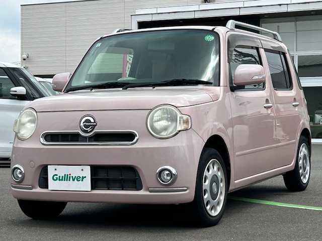 ダイハツ ミラ ココア プラスX 静岡県 2013(平25)年 5.1万km ムースピンクパール ワンオーナー/パワーステアリング/パワーウィンドウ/アイドリングストップ/リモコンキー/オートエアコン/社外ナビ（BT/フルセグTV）/ベンチシート/ルーフレール/ABS/Wエアバック/保証書/取扱説明書