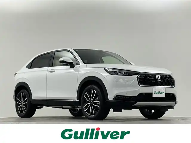 ホンダ ヴェゼル ハイブリッド e:HEV Z 埼玉県 2025(令7)年 0.1万km未満 プラチナホワイトパール 純正９型ナビ　フルセグＴＶ　Ｂｌｕｅｔｏｏｔｈ　バックカメラ　電動リアゲート　ハーフレザー　シートヒーター　置くだけ充電　レーダークルーズコントロール　コーナーセンサー　レーンアシスト　ＥＴＣ２．０