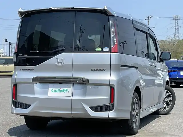 ホンダ ステップワゴン スパーダ クルスピセンシング 道央・札幌 2020(令2)年 6.1万km スーパープラチナメタリック ４WD/純正ディーラーOPナビ/CD/DVD/BT/フルセグ/純正フリップダウンモニター/ホンダセンシング/衝突被害軽減ブレーキ/横滑り防止装置/アダプティブクルーズコントロール/レーンキープアシスト/コーナーセンサー/バックカメラ/ビルトインETC2.0/ドライブレコーダー/アイドリングストップ/ECONモード/ワイパーデアイサー/両側パワースライドドア/前席シートヒーター/ハーフレザーシート/革巻きステアリング/ステアリングリモコン/パドルシフト/レーダー探知機/プッシュスタート/スマートキー/LEDヘッドライト/オートライト/フォグランプ/電動格納ミラー/ヒーテッドドアミラー/ウィンカーミラー/フロアマット/ドアバイザー/純正エンジンスターター/純正AW付夏タイヤ積込/205/60/R16/2020年/山1mm