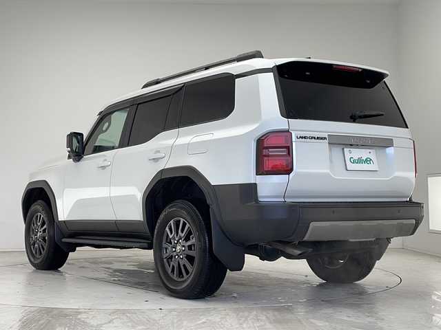 トヨタ ランドクルーザー ２５０ VX 愛知県 2024(令6)年 0.6万km プラチナホワイトパールマイカ 衝突軽減システム/プレミアムサウンドJBL/純正12.3型ディズプレイオーディオ　ナビあり/全方位カメラ/サンルーフ/レーダークルーズコントロール/シートヒーター/エアシート/フルセグ/Bluetooth/電動リアゲート/パワーシート/コーナーセンサー/純正アルミホイール/ルーフレール/ETC2.0/ブラインドスポットモニター/４WD/LEDヘッドライト/パドルシフト/ステアリングヒーター/インテリジェントミラー/リアオートエアコン/オートマチックハイビーム/置くだけ充電機/ステアリングスイッチ/スマートキー/プッシュスタート