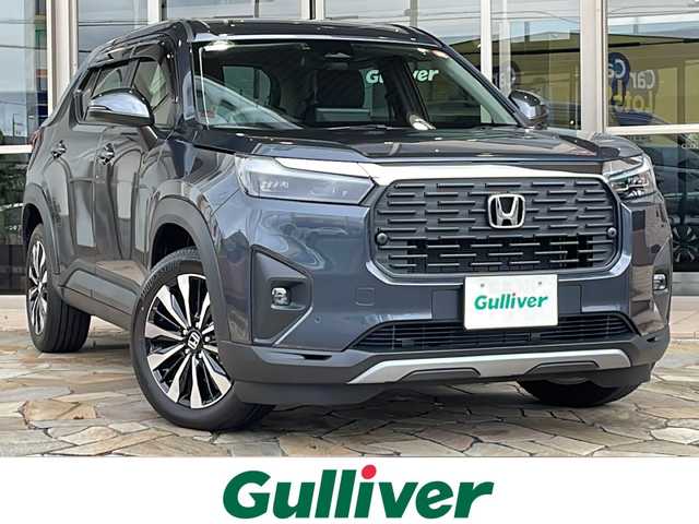 ホンダ ＷＲ－Ｖ Z 静岡県 2025(令7)年 0.2万km メテオロイドグレーメタリック 【安全機能】/ホンダセンシング/アダプティブ・クルーズ・コントロール（ACC）/・渋滞追従機能/車線維持支援システム（LKAS）/・作動車速：約65km/hから100km/h間/・ステアリング制御/衝突軽減ブレーキ（CMBS）/・歩行者検知機能/・作動車速：約80km/h未満時/・対向車車速：約30km/hから80km/h時/誤発進抑制機能（前後）/・前：ミリ波レーダー検知：作動車速10km/h未満　後：ソナー検知：作動車速10km/h未満/歩行者事故低減ステアリング/・作動車速10km/hから40km/h間/路外逸脱抑制機能/・作動車速：約60km/hから100km/h間/先行車発進お知らせ機能/標識認識機能/オートハイビーム/フロント＆バックソナー/【主要装備】/純正ディスプレイオーディオ　/プリクラッシュセーフティ　/ハーフレザーシート　/パドルシフト　/ステアリングスイッチ　/バックカメラ　/コーナーセンサー　/ＥＴＣ　/オートライト