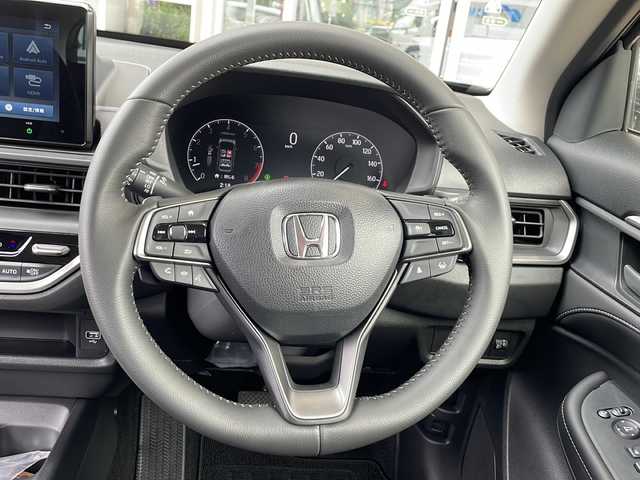 ホンダ ＷＲ－Ｖ Z 静岡県 2025(令7)年 0.2万km メテオロイドグレーメタリック 【安全機能】/ホンダセンシング/アダプティブ・クルーズ・コントロール（ACC）/・渋滞追従機能/車線維持支援システム（LKAS）/・作動車速：約65km/hから100km/h間/・ステアリング制御/衝突軽減ブレーキ（CMBS）/・歩行者検知機能/・作動車速：約80km/h未満時/・対向車車速：約30km/hから80km/h時/誤発進抑制機能（前後）/・前：ミリ波レーダー検知：作動車速10km/h未満　後：ソナー検知：作動車速10km/h未満/歩行者事故低減ステアリング/・作動車速10km/hから40km/h間/路外逸脱抑制機能/・作動車速：約60km/hから100km/h間/先行車発進お知らせ機能/標識認識機能/オートハイビーム/フロント＆バックソナー/【主要装備】/純正ディスプレイオーディオ　/プリクラッシュセーフティ　/ハーフレザーシート　/パドルシフト　/ステアリングスイッチ　/バックカメラ　/コーナーセンサー　/ＥＴＣ　/オートライト