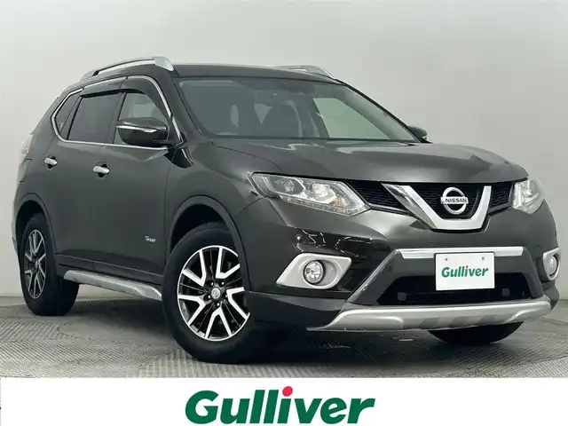 日産 エクストレイル ハイブリッド 20X エクストリーマーXエマージェンシーブレーキ 道央・札幌 2016(平28)年 6.8万km チタニウムカーキ ・４WD/・プロパイロット/・純正9インチナビ/　CD/DVD/SD/BT/フルセグ/・バックカメラ/・インテリジェントルームミラー/・ビルトインETC/・前方ドライブレコーダー/・エマージェンシーブレーキ/・レーダークルーズコントロール/・レーンキープアシスト/・クリアランスソナー/・カプロンシート/・前席シートヒーター/・ルーフレール/・LEDヘッドライト/・フォグライト/・オートライト/・純正フロアマット/・ドアバイザー