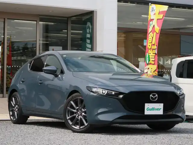 マツダ マツダ３ファストバック 20S Lパッケージ 千葉県 2019(令1)年 2.9万km ポリメタルグレーM ワンオーナー/令和1/2/3/4/5/6/7年ディーラー点検記録簿あり/純正ナビ/バックカメラ/AM/FM/CD/DVD/Bluetooth/フルセグTV/HDMI/黒革シート/前席シートヒーター /ビルトインETC/純正フロアマット/純正18インチAW/前方ドライブレコーダー/マツダレーダークルーズコントロール/レーンキープアシストシステム/ブラインドスポットモニタリング/アイドリングストップ/ステアリングヒーター/パドルシフト/LEDヘッドライト/電動パーキングブレーキ/オートホールド/ISOFIX対応シート/取扱説明書/保証書/スマートキー×2本