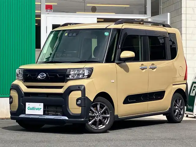 ダイハツ タント ファンクロス 静岡県 2022(令4)年 3.9万km ベージュ 純正ナビ(CD/DVD/BT/フルセグ)/バックカメラ/D席N席シートヒーター/両側パワースライドドア/ETC/エンジンスタートボタン/パワーステアリング/パワーウィンドウ/取扱説明書/アイドリングストップ/スマートキー/スペアキー１本/オートエアコン/USB入力端子/ベンチシート/純正フロアマット/布シート/ルーフレール/純正アルミホイール/ABS/横滑り防止装置/コーナーセンサー前後/レーンキープアシスト/盗難防止装置/オートライト/LEDヘッドライト/W+サイドエアバック/カーテンエアバック/衝突軽減システム