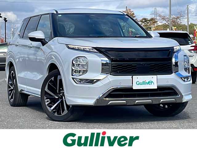 三菱 アウトランダー ＰＨＥＶ P 道央・札幌 2022(令4)年 4.2万km ホワイトダイヤモンド ４WD/ワンオーナー/プラグインハイブリッド/寒冷地仕様/サンルーフ/BOSEサウンドシステム/純正メーカーナビ/AM/FM/BT/フルセグ/スポーティパッケージ/衝突被害軽減ブレーキ/横滑り防止装置/アダプティブクルーズコントロール/ヒルディセントコントロール/レーンキープアシスト/クリアランスソナー/アラウンドビューモニター/ビルトインETC/自動防眩ミラー/DRIVEMODE切替/EVMODE/ワイパーデアイサー/パワーバックドア/前席パワーシート/前席メモリーシート/前席/２列目シートヒーター/レザーシート/革巻きステアリング/ステアリングリモコン/パドルシフト/ハンドルヒーター/AC100V/電動パーキング/オートブレーキホールド/プッシュスタート/スマートキー/LEDヘッドライト/オートライト/フォグランプ/電動格納ミラー/ウィンカーミラー/純正フロアマット/社外グリル（純正グリル積み込み）