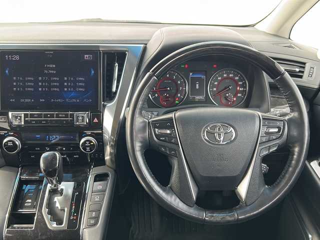 トヨタ アルファード S Cパッケージ 愛媛県 2018(平30)年 3.4万km ホワイトパールクリスタルシャイン モデリスタエアロ/車検R9年9月/登録時34025km/ALPINE10インチナビ/（Bluetooth/フルセグTV/AUX/USB入力端子）/バックカメラ/両側電動スライドドア/パワーバックドア/トヨタセーフティセンス/・レーンキープアシスト/・プリクラッシュセーフティ/・ハイビームアシスト/・レーダークルーズコントロール/ビルトインETC/LEDヘッドライト/オートマチックハイビーム/コーナーセンサー/パワーシート/ドライブレコーダー/ローダウンサス/オットマン/黒本革シート/シートヒーター/エアシート/純正18インチAW/ローダウン