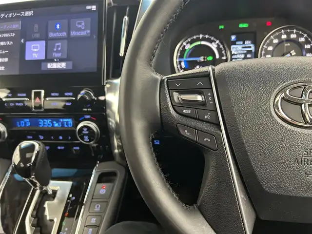 トヨタ アルファードハイブリット SR Cパッケージ 千葉県 2021(令3)年 1.8万km スパークリングブラックパールクリスタルシャイン ツインムーンルーフ/リアエンターテイメントシステム/トヨタセーフティセンス/・プリクラッシュセーフティ/・レーントレーシングアシスト/・クリアランスソナー/・ブラインドスポットモニター/・ロードサインアシスト/純正ディスプレイオーディオ/・JBLサウンド/・USB/・Bluetooth/・フルセグTV/・Miracast/バックカメラ/両側パワースライドドア/レーダークルーズコントロール/LEDオートライト/レザーシート/メモリ付きパワーシート/シートエアコン/純正17インチアルミホイール/革巻きステアリング/サイドバイザー/ステアリングスイッチ/プッシュスタート/スマートキー/ビルトインETC2.0