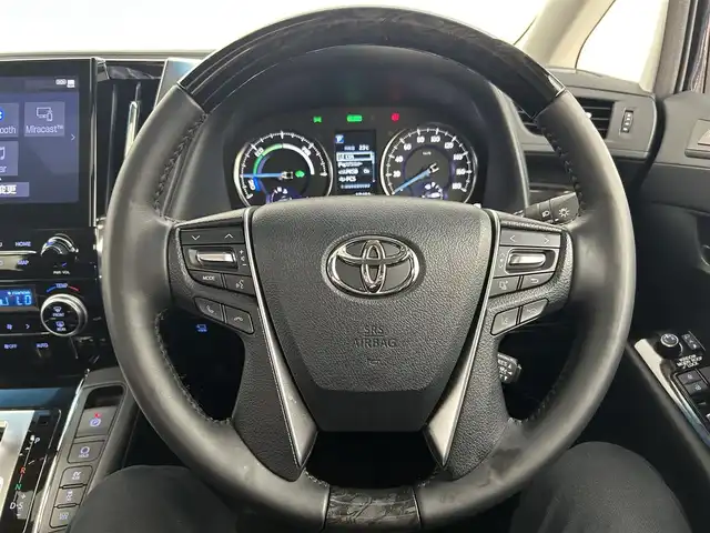 トヨタ アルファードハイブリット SR Cパッケージ 千葉県 2021(令3)年 1.8万km スパークリングブラックパールクリスタルシャイン ツインムーンルーフ/リアエンターテイメントシステム/トヨタセーフティセンス/・プリクラッシュセーフティ/・レーントレーシングアシスト/・クリアランスソナー/・ブラインドスポットモニター/・ロードサインアシスト/純正ディスプレイオーディオ/・JBLサウンド/・USB/・Bluetooth/・フルセグTV/・Miracast/バックカメラ/両側パワースライドドア/レーダークルーズコントロール/LEDオートライト/レザーシート/メモリ付きパワーシート/シートエアコン/純正17インチアルミホイール/革巻きステアリング/サイドバイザー/ステアリングスイッチ/プッシュスタート/スマートキー/ビルトインETC2.0