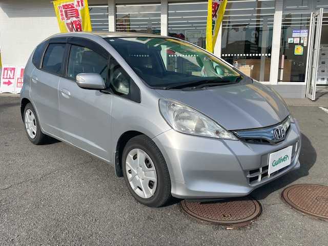 ホンダ フィット ハイブリット 神奈川県 2011(平23)年 4.3万km アラバスターシルバーメタリック クルーズコントロール/純正ナビ/（RCA/CD/DVD/AM/FM/ワンセグTV）/バックカメラ/ECONシステム/ハロゲンヘッドライト/ヘッドライトレベライザー/電動格納ミラー/二列目フルフラットシート/純正フロアマット