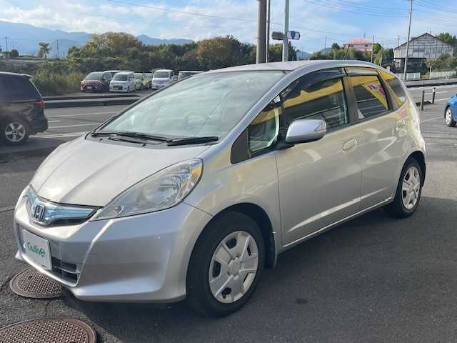 ホンダ フィット ハイブリット 神奈川県 2011(平23)年 4.3万km アラバスターシルバーメタリック クルーズコントロール/純正ナビ/（RCA/CD/DVD/AM/FM/ワンセグTV）/バックカメラ/ECONシステム/ハロゲンヘッドライト/ヘッドライトレベライザー/電動格納ミラー/二列目フルフラットシート/純正フロアマット