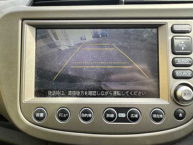 ホンダ フィット ハイブリット 神奈川県 2011(平23)年 4.3万km アラバスターシルバーメタリック クルーズコントロール/純正ナビ/（RCA/CD/DVD/AM/FM/ワンセグTV）/バックカメラ/ECONシステム/ハロゲンヘッドライト/ヘッドライトレベライザー/電動格納ミラー/二列目フルフラットシート/純正フロアマット