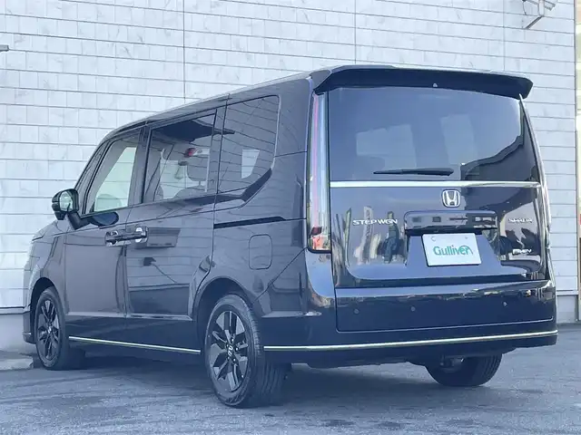 ホンダ ステップワゴン スパーダ eHEV 群馬県 2023(令5)年 2.9万km ミッドナイトブルービームM ホンダセンシング/・衝突軽減ブレーキ/・誤発進抑制機能/・後方誤発進抑制機能/・近距離衝突軽減ブレーキ/・歩行者事故低減ステアリング/・路外逸脱抑制機能/・渋滞追従機能付アダプティブクルーズコントロール/・車線維持支援システム/・トラフィックジャムアシスト/・先行車発進お知らせ機能/・標識認識機能/・オートハイビーム/・ブラインドスポットインフォメーション/フルセグTV/社外フリップダウンミニター/バックカメラ/ハーフレザー/シートヒーター（D席/N席）/レーダークルコン/パドルシフト/両側パワースライド/前後ドラレコ/社外GPSレーダー/パワーバックドア/LEDヘッドライト/純正AW/純正フロアマット
