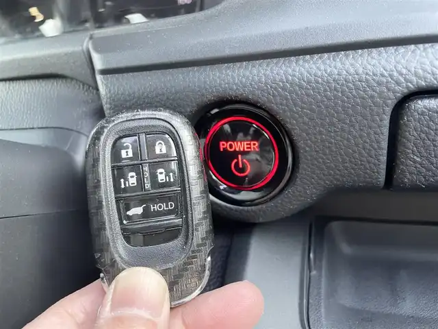 ホンダ ステップワゴン スパーダ eHEV 群馬県 2023(令5)年 2.9万km ミッドナイトブルービームM ホンダセンシング/・衝突軽減ブレーキ/・誤発進抑制機能/・後方誤発進抑制機能/・近距離衝突軽減ブレーキ/・歩行者事故低減ステアリング/・路外逸脱抑制機能/・渋滞追従機能付アダプティブクルーズコントロール/・車線維持支援システム/・トラフィックジャムアシスト/・先行車発進お知らせ機能/・標識認識機能/・オートハイビーム/・ブラインドスポットインフォメーション/フルセグTV/社外フリップダウンミニター/バックカメラ/ハーフレザー/シートヒーター（D席/N席）/レーダークルコン/パドルシフト/両側パワースライド/前後ドラレコ/社外GPSレーダー/パワーバックドア/LEDヘッドライト/純正AW/純正フロアマット