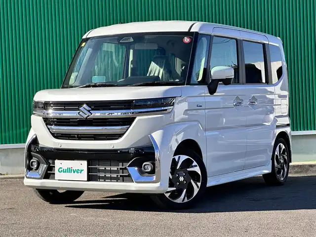 スズキ スペーシア カスタム HYBRID XS 宮城県 2023(令5)年 0.7万km ピュアホワイトP 純正メモリナビ/（DVD/フルセグ/BT/SmartphoneLink/USB）/全方位カメラ/スズキセーフティサポート/レーダークルーズコントロール/コーナーセンサー/両側パワースライドドア/ヘッドアップディスプレイ/ハーフレザーシート/D/N席シートヒーター/革巻きステアリング/ステアリングヒーター/ステアリングスイッチ/後席サンシェード/電動パーキングブレーキ/ブレーキホールド/ウィンカーミラー/LEDヘッドライト/フォグランプ/スマートキー/プッシュスタート