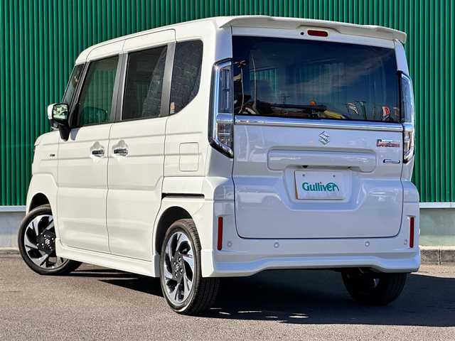 スズキ スペーシア カスタム HYBRID XS 宮城県 2023(令5)年 0.7万km ピュアホワイトP 純正メモリナビ/（DVD/フルセグ/BT/SmartphoneLink/USB）/全方位カメラ/スズキセーフティサポート/レーダークルーズコントロール/コーナーセンサー/両側パワースライドドア/ヘッドアップディスプレイ/ハーフレザーシート/D/N席シートヒーター/革巻きステアリング/ステアリングヒーター/ステアリングスイッチ/後席サンシェード/電動パーキングブレーキ/ブレーキホールド/ウィンカーミラー/LEDヘッドライト/フォグランプ/スマートキー/プッシュスタート