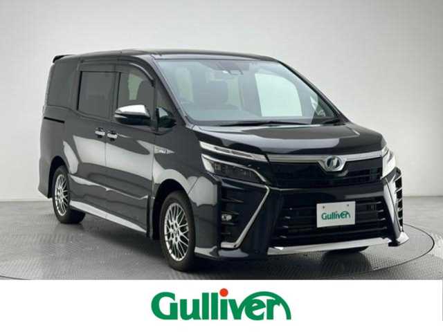 トヨタ ヴォクシー ハイブリッド ZS 煌Ⅱ 兵庫県 2019(令1)年 3.6万km ブラック 社外9インチナビ（MDJ-M906HDL）/フルセグTV/FM/AM/BT/CD/DVD/バックカメラ/ETC/ドライブレコーダー（DRV-MR740）/シートヒーター/両側パワースライドドア/スマートキー/コーナーセンサー/トヨタセーフティーセンス/レーンキープアシスト/トラクションコントロール/ステアリングスイッチ/オートマチックハイビーム/衝突被害軽減システム/純正フロアマット/純正16インチAW/純正LEDヘッドライト/純正ドアバイザー/電動格納ドアミラー