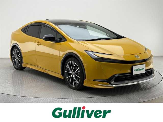 トヨタ プリウス Z 埼玉県 2023(令5)年 1.2万km 黄 純正ディスプレイオーディオ/（Bluetooth/HDMI/USB/フルセグTV/スマホ連携）/純正メモリナビ/バック/サイドカメラ/パノラマルーフ/アダクティブクルーズコントロール/レーンディパーチャーアラート/レーンキープアシスト/プリクラッシュセーフティー/ブラインドスポットモニター/パーキングアシスト/コーナーセンサー（前後）/デジタルインナーミラー/レザーシート/シートヒーター（D/N席）/ベンチレーション（D/N席）/D席パワーシート/ステアリングヒーター/パワーバックドア/LEDヘッドライト/オートライト/オートマチックハイビーム/ヘッドライトレベライザー/ビルトインETC2.0/モデリスタスポイラー（フロント/サイド/リア）/TVキット/ワイヤレス充電/純正19インチアルミホイール/純正フロアマット/スマートキー/スペアキー1本/OPスペアタイヤ