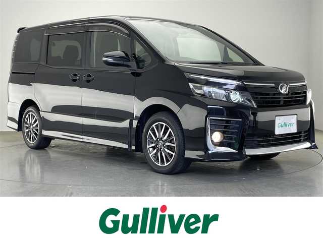 トヨタ ヴォクシー ZS 愛知県 2014(平26)年 7.8万km ブラック 純正９型メモリナビ　フルセグＴＶ　アルパイン後席モニター　バックカメラ　両側パワースライドドア　ＥＴＣ　ＬＥＤオートライト　前後ドラレコ　Ｂｌｕｅｔｏｏｔｈ　ステアリングスイッチ　フォグランプ　禁煙車