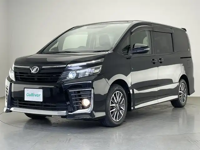 トヨタ ヴォクシー ZS 愛知県 2014(平26)年 7.8万km ブラック 純正９型メモリナビ　フルセグＴＶ　アルパイン後席モニター　バックカメラ　両側パワースライドドア　ＥＴＣ　ＬＥＤオートライト　前後ドラレコ　Ｂｌｕｅｔｏｏｔｈ　ステアリングスイッチ　フォグランプ　禁煙車