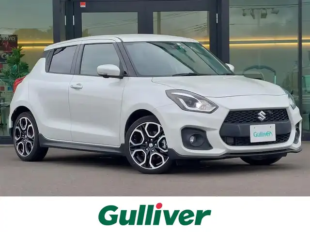 スズキ スイフト スポーツ 東京都 2023(令5)年 2.4万km ピュアホワイトP 純正8インチナビ/フルセグ/全方位モニター/ビルトインETC/ドライブレコーダー/衝突軽減ブレーキ/レーンキープアシスト/コーナーセンサー/ブラインドスポットモニター/レーダークルーズコントロール/スマートキー/純正17インチAW