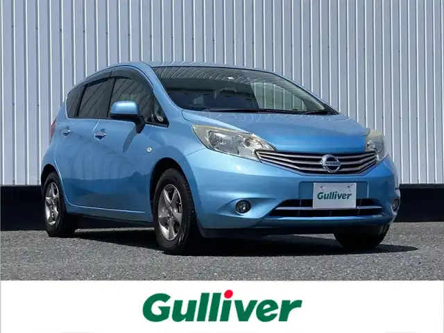 日産 ノート メダリスト エマージェンシーB 千葉県 2014(平26)年 5.5万km ソニックブルー 社外7インチナビ/（TV CD DVD BT FM AM）/全周囲カメラ/衝突被害軽減システム/車線逸脱警報/横滑り防止装置/ETC/アイドリングストップ/オートライト/電動格納ミラー/社外14インチAW/プッシュスタート/スマートキー/フロアマット/ドアバイザー/取扱説明書/保証書