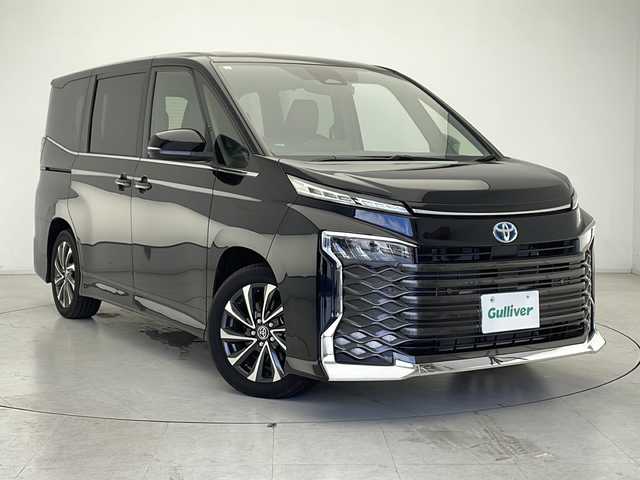 トヨタ ヴォクシー ハイブリッド S－Z 千葉県 2023(令5)年 1.3万km アティチュードブラックマイカ 純正ディスプレイオーディオ/フルセグTV/バックカメラ/両側パワースライドドア/レーダークルーズコントロール/プリクラッシュセーフティ/レーンキープアシスト/純正ビルトインETC/AC100V電源/ハーフレザーシート/シートヒーター/前後ドライブレコーダー/ステアリングリモコン