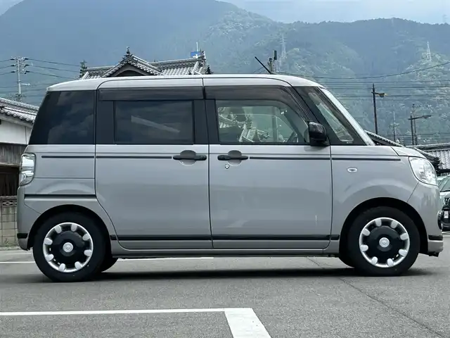 ダイハツ ムーヴ キャンバス G ブラックアクセント リミテッド SAⅢ 愛媛県 2020(令2)年 4.5万km グレーマイカM ワンオーナー/純正9インチナビ(フルセグTV/DVD/Bluetooth/HDMI)/全周囲カメラ/両側パワースライドドア/ETC/ナビ連動型ドライブレコーダー/レーンキープアシスト/横滑り防止装置/盗難防止装置/レーンキープアシスト/オートライト/オートマチックハイビーム/LEDヘッドライト/フォグランプ/コーナーセンサー/サイドエアバッグ/純正フロアマット/純正ドアバイザー/衝突軽減システム/スマートキー/ABS