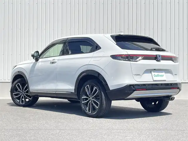 ホンダ ヴェゼル ハイブリッド e:HEV Z 群馬県 2022(令4)年 3.4万km プラチナホワイトパール ホンダセンシング/・衝突軽減ブレーキ/・誤発進抑制機能/・後方誤発進抑制機能/・近距離衝突軽減ブレーキ/・歩行者事故軽減ステアリング/・路外逸脱抑制機能/・渋滞追従機能付アダプティブクルーズコントロール/・車線維持支援システム/・先行車発進お知らせ機能/・標識認識機能/・オートハイビーム/・パーキングセンサーシステム/純正ナビ/バックカメラ/ハンズフリーアクセスパワーテールゲート(予約クローズ機能付)/ETC/ハーフレザー/シートヒーター/（D席/N席）/純正前後ドラレコ/純正AW/純正フロアマット/パドルシフト/ステアリングスイッチ