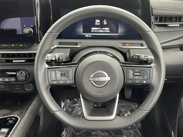 日産 オーラ G 埼玉県 2024(令6)年 0.2万km ピュアホワイトパール ＢＯＳＥスピーカー　純正９型ナビ　プロパイロット　ＢＳＭ　全方位カメラ　ＥＴＣ　ドライブレコーダー　スマートインナーミラー　フルセグＴＶ　追従走行　ＬＥＤ　ハーフレザーシート　パワーシート
