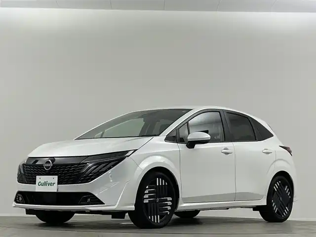日産 オーラ G 埼玉県 2024(令6)年 0.2万km ピュアホワイトパール ＢＯＳＥスピーカー　純正９型ナビ　プロパイロット　ＢＳＭ　全方位カメラ　ＥＴＣ　ドライブレコーダー　スマートインナーミラー　フルセグＴＶ　追従走行　ＬＥＤ　ハーフレザーシート　パワーシート