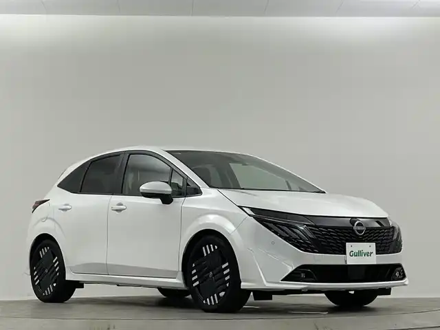 日産 オーラ G 埼玉県 2024(令6)年 0.2万km ピュアホワイトパール ＢＯＳＥスピーカー　純正９型ナビ　プロパイロット　ＢＳＭ　全方位カメラ　ＥＴＣ　ドライブレコーダー　スマートインナーミラー　フルセグＴＶ　追従走行　ＬＥＤ　ハーフレザーシート　パワーシート