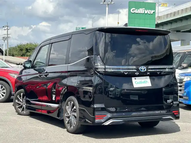 トヨタ ヴォクシー ハイブリッド S－Z 愛知県 2023(令5)年 4.2万km アティチュードブラックマイカ コネクテッドナビ９インチ/純正リアモニター１４インチ/ＤＴＶ/ＢＴ/ＣＤ／ＤＶＤ/ＥＴＣ/両側パワースライドドア/パワーバックドア/純正フロアマット/ドアバイザー/モデリスタエアロＦ・Ｓ・Ｒ/オットマン/ブラインドスポットモニター/レーダークルーズコントロール/衝突軽減ブレーキ/ＡＣ１００Ｖ/ステアリングスイッチ/ハーフレザー