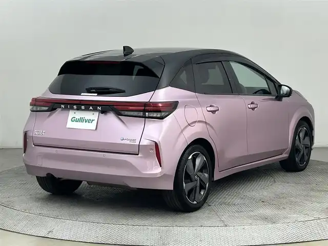 日産 オーラ G FOUR 道央・札幌 2022(令4)年 5.7万km ピンク ・4WD/・エマージェンシーブレーキ/・レーンキープアシスト/・ブラインドスポットモニター/・標識検知システム/・後退時車両検知システム/・クリアランスソナー/・純正メモリナビ/・全方位カメラ/フルセグ/BT/CD/・ETC/・シートヒーター/・ステアリングヒーター/・デジタルインナーミラー/・ドライブレコーダー/・ステアリングスイッチ/・オートブレーキホールド/・スマートキー/・プッシュスタート