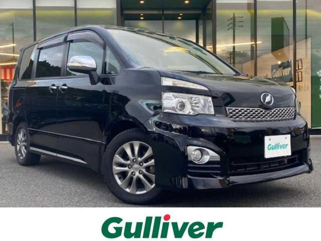 トヨタ ヴォクシー ZS 煌Ⅱ 兵庫県 2011(平23)年 10.9万km ブラック 社外ナビ/・フルセグTV（CD/DVD/HDD/Bluetooth/ラジオ）/バックモニター/オーディオトリップ/パドルシフト/ウォークスルー/システムコンソール（COOL/HOT)/フリップダウンモニター/両側スライドドア/純正マット/ETC