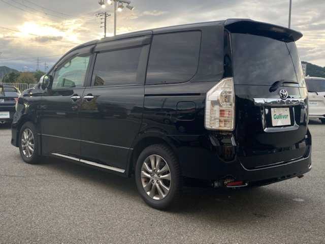 トヨタ ヴォクシー ZS 煌Ⅱ 兵庫県 2011(平23)年 10.9万km ブラック 社外ナビ/・フルセグTV（CD/DVD/HDD/Bluetooth/ラジオ）/バックモニター/オーディオトリップ/パドルシフト/ウォークスルー/システムコンソール（COOL/HOT)/フリップダウンモニター/両側スライドドア/純正マット/ETC