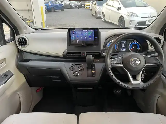 日産 デイズ B 千葉県 2021(令3)年 2.5万km ホワイト 社外ナビ【フルセグ、BT、SD、USB、CD】/前後コーナーセンサー/アイドリングストップ/ETC/USB充電/バックカメラ/オートライト/ステアリングスイッチ/純正フロアマット/純正ホイールキャップ/保証書/取説