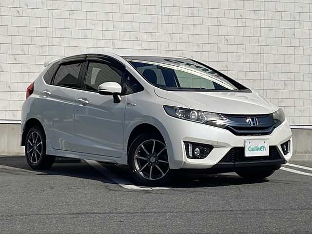 ホンダ フィット ハイブリット Sパッケージ 山形県 2014(平26)年 2.3万km プレミアムホワイトパール ワンオーナー/4WD/純正ナビ/（フルセグ/DVD/CD/BT/USB/HDMI）/シティブレーキアクティブシステム/横滑り防止/バックカメラ/クルーズコントロール/アイドリングストップ/コーナーセンサー/LEDヘッドライト/フォグランプ/ステアリングリモコン/エンジンスターター/プッシュスタート/冬タイヤ純正AW車載