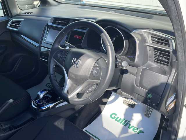 ホンダ フィット ハイブリット Sパッケージ 山形県 2014(平26)年 2.3万km プレミアムホワイトパール ワンオーナー/4WD/純正ナビ/（フルセグ/DVD/CD/BT/USB/HDMI）/シティブレーキアクティブシステム/横滑り防止/バックカメラ/クルーズコントロール/アイドリングストップ/コーナーセンサー/LEDヘッドライト/フォグランプ/ステアリングリモコン/エンジンスターター/プッシュスタート/冬タイヤ純正AW車載