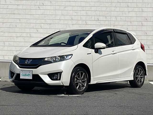 ホンダ フィット ハイブリット Sパッケージ 山形県 2014(平26)年 2.3万km プレミアムホワイトパール ワンオーナー/4WD/純正ナビ/（フルセグ/DVD/CD/BT/USB/HDMI）/シティブレーキアクティブシステム/横滑り防止/バックカメラ/クルーズコントロール/アイドリングストップ/コーナーセンサー/LEDヘッドライト/フォグランプ/ステアリングリモコン/エンジンスターター/プッシュスタート/冬タイヤ純正AW車載