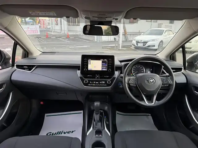 トヨタ カローラツーリング ハイブリッド G－X プラス 香川県 2021(令3)年 9.4万km ホワイトパールクリスタルシャイン ワンオーナー/ディスプレイオーディオナビ/フルセグ/バックカメラ/セーフティセンス/レーダークルーズ/オートハイビーム/レーンキープ/LEDヘッドライト/スマートキー/ビルトインETC