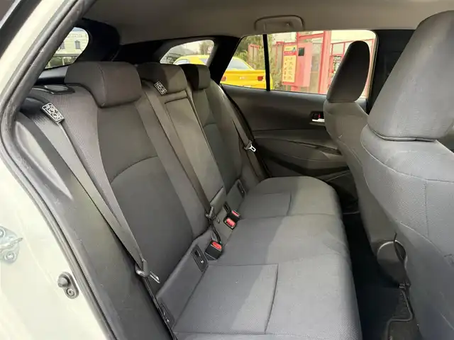 トヨタ カローラツーリング ハイブリッド G－X プラス 香川県 2021(令3)年 9.4万km ホワイトパールクリスタルシャイン ワンオーナー/ディスプレイオーディオナビ/フルセグ/バックカメラ/セーフティセンス/レーダークルーズ/オートハイビーム/レーンキープ/LEDヘッドライト/スマートキー/ビルトインETC