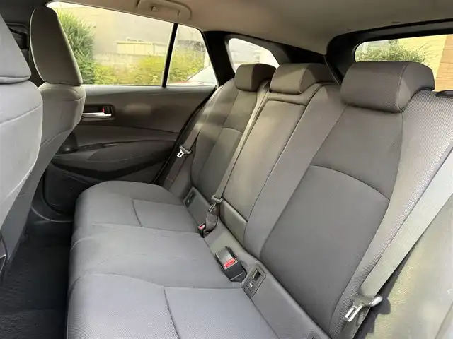 トヨタ カローラツーリング ハイブリッド G－X プラス 香川県 2021(令3)年 9.4万km ホワイトパールクリスタルシャイン ワンオーナー/ディスプレイオーディオナビ/フルセグ/バックカメラ/セーフティセンス/レーダークルーズ/オートハイビーム/レーンキープ/LEDヘッドライト/スマートキー/ビルトインETC