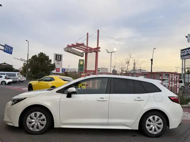 トヨタ カローラツーリング ハイブリッド G－X プラス 香川県 2021(令3)年 9.4万km ホワイトパールクリスタルシャイン ワンオーナー/ディスプレイオーディオナビ/フルセグ/バックカメラ/セーフティセンス/レーダークルーズ/オートハイビーム/レーンキープ/LEDヘッドライト/スマートキー/ビルトインETC