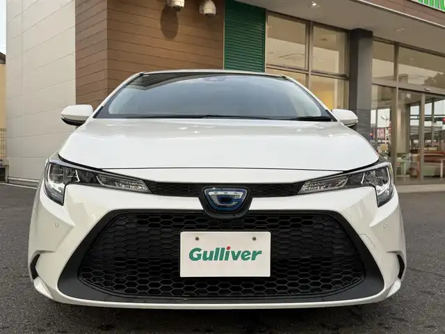 トヨタ カローラツーリング ハイブリッド G－X プラス 香川県 2021(令3)年 9.4万km ホワイトパールクリスタルシャイン ワンオーナー/ディスプレイオーディオナビ/フルセグ/バックカメラ/セーフティセンス/レーダークルーズ/オートハイビーム/レーンキープ/LEDヘッドライト/スマートキー/ビルトインETC